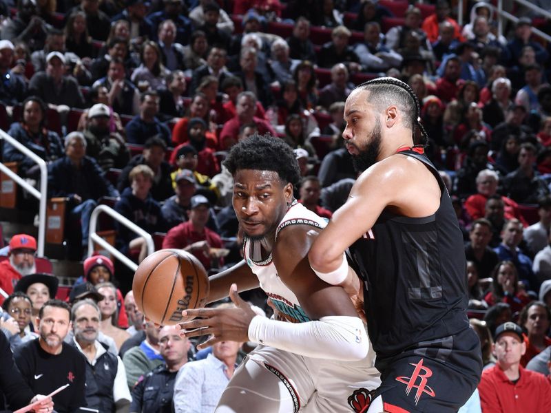 HOUSTON, TX - JANUARY 13:  Jaren Jackson Jr. #13 of the Memphis Grizzlies dribbles the ball during the game against the Houston Rockets  on January 13, 2025 at the Toyota Center in Houston, Texas. NOTE TO USER: User expressly acknowledges and agrees that, by downloading and or using this photograph, User is consenting to the terms and conditions of the Getty Images License Agreement. Mandatory Copyright Notice: Copyright 2024 NBAE (Photo by Logan Riely/NBAE via Getty Images)