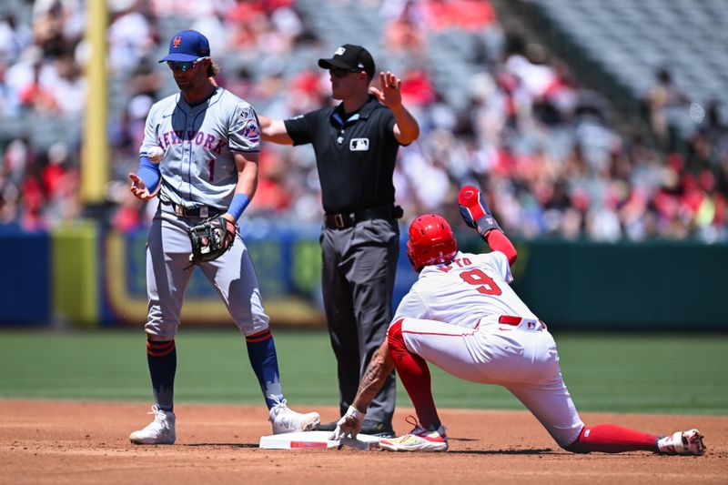 Aug 4, 2024; Anaheim, California, USA; Los Angeles Angels shortstop Zach Neto (9) steals second base Los Angeles Angel against New York Mets second baseman Jeff McNeil (1) during the first inning at Angel Stadium. Mandatory Credit: Jonathan Hui-USA TODAY Sports