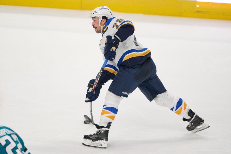 Nov 16, 2023; San Jose, California, USA; St. Louis Blues defenseman Justin Faulk (72) shoots the puck and scores a goal against the San Jose Sharks during the third period at SAP Center at San Jose. Mandatory Credit: Robert Edwards-USA TODAY Sports