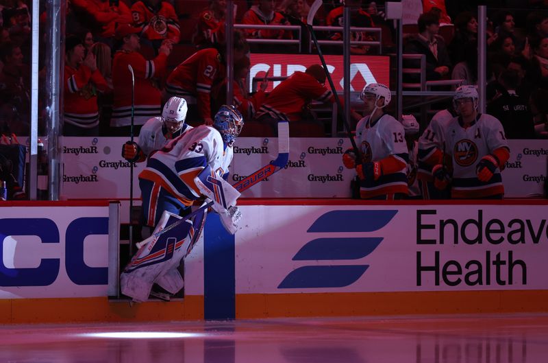 Dec 30, 2025; Chicago, Illinois, USA; New York Islanders goaltender David Rittich (33) takes the ice before a game against the Chicago Blackhawks at United Center. Mandatory Credit: Talia Sprague-Imagn Images