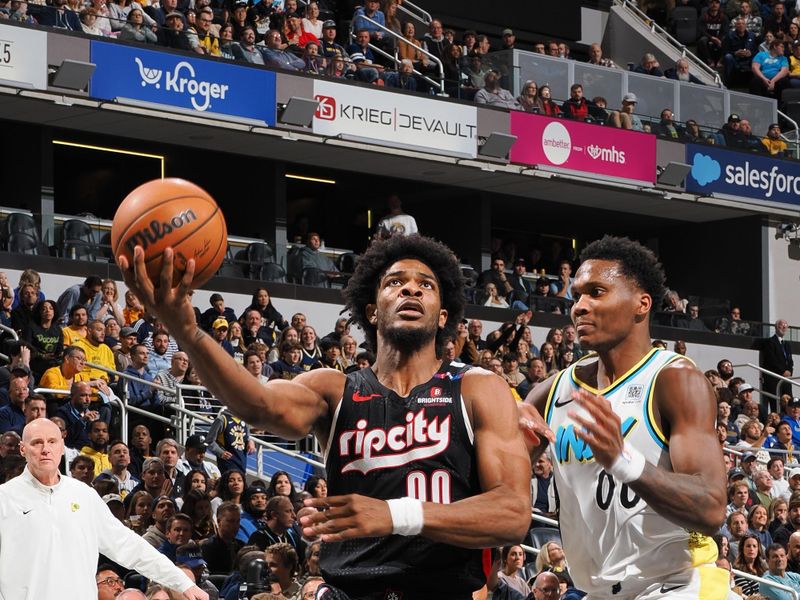 INDIANAPOLIS, IN - NOVEMBER 27: Scoot Henderson #00 of the Portland Trail Blazers drives to the basket during the game against the Indiana Pacers on November 27, 2024 at Gainbridge Fieldhouse in Indianapolis, Indiana. NOTE TO USER: User expressly acknowledges and agrees that, by downloading and or using this Photograph, user is consenting to the terms and conditions of the Getty Images License Agreement. Mandatory Copyright Notice: Copyright 2024 NBAE (Photo by Ron Hoskins/NBAE via Getty Images)