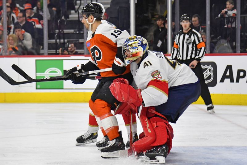 Mar 24, 2024; Philadelphia, Pennsylvania, USA; Florida Panthers goaltender Anthony Stolarz (41) looks around screen by Philadelphia Flyers right wing Garnet Hathaway (19) during the third period at Wells Fargo Center. Mandatory Credit: Eric Hartline-USA TODAY Sports