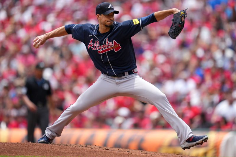 Jun 25, 2023; Cincinnati, Ohio, USA; Atlanta Braves starting pitcher Charlie Morton (50) delivers in the first inning of a baseball game against the Cincinnati Reds at Great American Ball Park. Mandatory Credit: Kareem Elgazzar-USA TODAY Sports