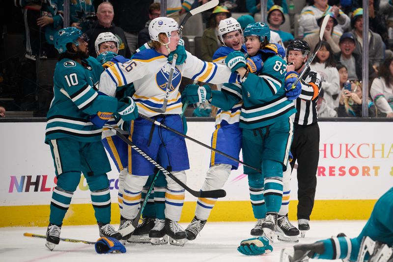 Jan 27, 2024; San Jose, California, USA; Buffalo Sabres defenseman Rasmus Dahlin (26) and right wing Tage Thompson (72) push and shove after the whistle against San Jose Sharks defenseman Nikita Okhotiuk (83) and left wing Anthony Duclair (10) during the third period at SAP Center at San Jose. Mandatory Credit: Robert Edwards-USA TODAY Sports