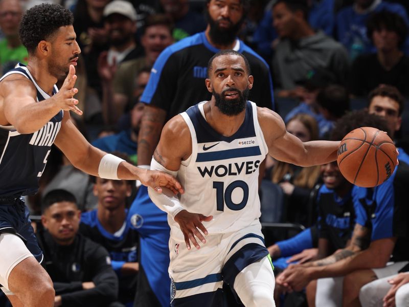 MINNEAPOLIS, MN -  OCTOBER 29: Mike Conley #10 of the Minnesota Timberwolves dribbles the ball during the game against the Dallas Mavericks on October 29, 2024 at Target Center in Minneapolis, Minnesota. NOTE TO USER: User expressly acknowledges and agrees that, by downloading and or using this Photograph, user is consenting to the terms and conditions of the Getty Images License Agreement. Mandatory Copyright Notice: Copyright 2024 NBAE (Photo by David Sherman/NBAE via Getty Images)