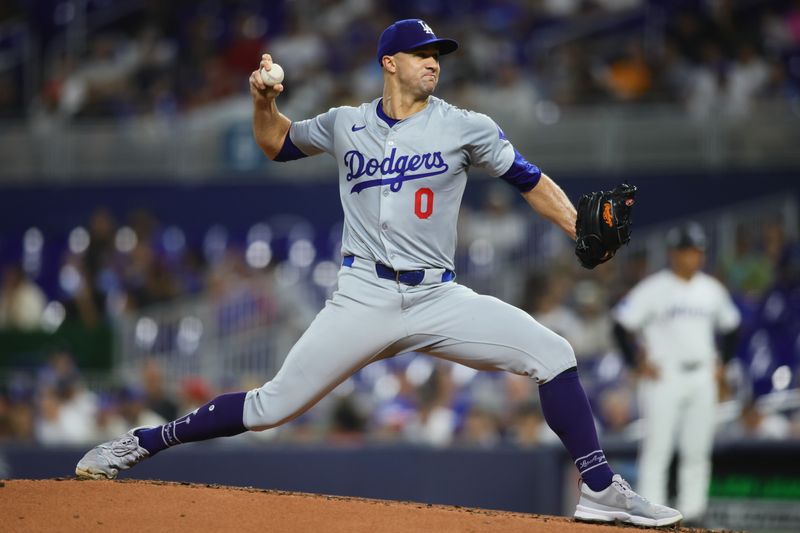 Sep 19, 2024; Miami, Florida, USA; Los Angeles Dodgers starting pitcher Jack Flaherty (0) delivers a pitch against the Miami Marlins during the first inning at loanDepot Park. Mandatory Credit: Sam Navarro-Imagn Images