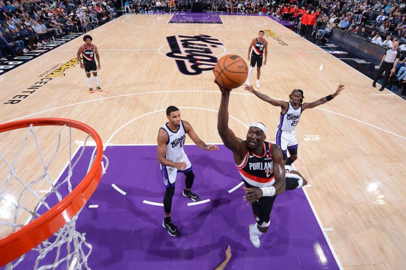 SACRAMENTO, CA - OCTOBER 13: Duop Reath #26 of the Portland Trail Blazers drives to the basket during the game against the Sacramento Kings during a NBA preseason game on October 13, 2024 at Golden 1 Center in Sacramento, California. NOTE TO USER: User expressly acknowledges and agrees that, by downloading and or using this Photograph, user is consenting to the terms and conditions of the Getty Images License Agreement. Mandatory Copyright Notice: Copyright 2024 NBAE (Photo by Rocky Widner/NBAE via Getty Images)