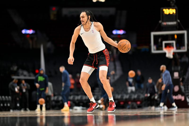 PORTLAND, OREGON - FEBRUARY 15: Dalano Banton #5 of the Portland Trail Blazers warms up before the game against the Minnesota Timberwolves at the Moda Center on February 15, 2024 in Portland, Oregon. NOTE TO USER: User expressly acknowledges and agrees that, by downloading and or using this photograph, User is consenting to the terms and conditions of the Getty Images License Agreement. (Photo by Alika Jenner/Getty Images)