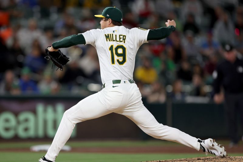May 24, 2025; West Sacramento, California, USA; Athletics pitcher Mason Miller (19) throws a pitch against the Philadelphia Phillies during the ninth inning at Sutter Health Park. Mandatory Credit: Dennis Lee-Imagn Images