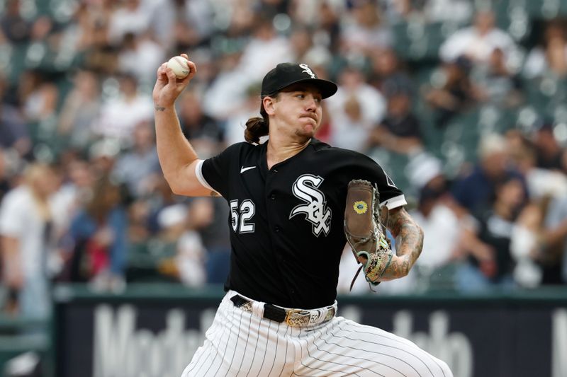 Aug 9, 2023; Chicago, Illinois, USA; Chicago White Sox starting pitcher Mike Clevinger (52) delivers a pitch against the New York Yankees during the first inning at Guaranteed Rate Field. Mandatory Credit: Kamil Krzaczynski-USA TODAY Sports