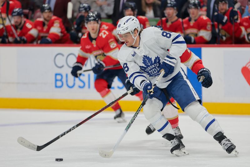 Apr 8, 2025; Sunrise, Florida, USA; Toronto Maple Leafs right wing William Nylander (88) moves the puck against the Florida Panthers during the second period at Amerant Bank Arena. Mandatory Credit: Sam Navarro-Imagn Images