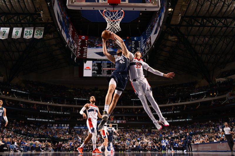 DALLAS, TX - FEBRUARY 12: Maxi Kleber #42 of the Dallas Mavericks and Kyle Kuzma #33 of the Washington Wizards battle for a rebound on February 12, 2024 at the American Airlines Center in Dallas, Texas. NOTE TO USER: User expressly acknowledges and agrees that, by downloading and or using this photograph, User is consenting to the terms and conditions of the Getty Images License Agreement. Mandatory Copyright Notice: Copyright 2024 NBAE (Photo by Glenn James/NBAE via Getty Images)