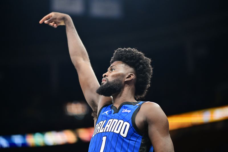 ORLANDO, FLORIDA - NOVEMBER 12: Jonathan Isaac #1 of the Orlando Magic shoots a three-point-basket in the second half against the Charlotte Hornets during an Emirates NBA Cup game at Kia Center on November 12, 2024 in Orlando, Florida. NOTE TO USER: User expressly acknowledges and agrees that, by downloading and or using this photograph, User is consenting to the terms and conditions of the Getty Images License Agreement. (Photo by Julio Aguilar/Getty Images)