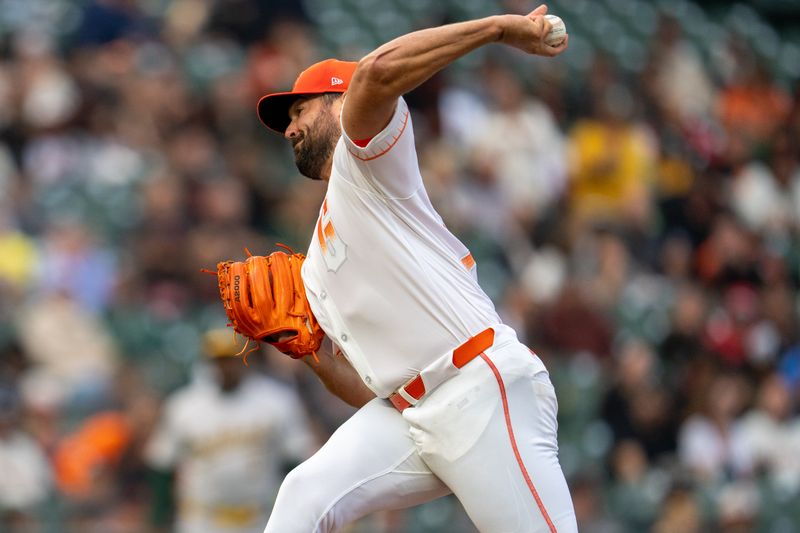 Jul 30, 2024; San Francisco, California, USA;  San Francisco Giants starting pitcher Robbie Ray (23) delivers a pitch against the Oakland Athletics during the first inning at Oracle Park. Mandatory Credit: Neville E. Guard-USA TODAY Sports