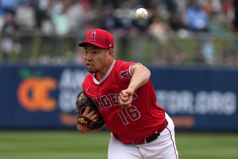 Mar 14, 2025; Tempe, Arizona, USA; Los Angeles Angels pitcher Yusei Kikuchi (16) throws against the Kansas City Royals in the first inning at Tempe Diablo Stadium. Mandatory Credit: Rick Scuteri-Imagn Images