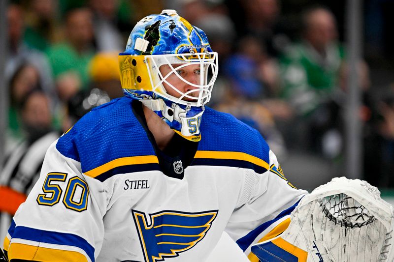 Apr 17, 2024; Dallas, Texas, USA; St. Louis Blues goaltender Jordan Binnington (50) faces the Dallas Stars attack during the second period at the American Airlines Center. Mandatory Credit: Jerome Miron-USA TODAY Sports