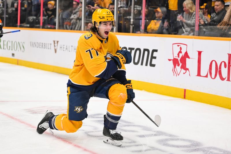 Nov 29, 2025; Nashville, Tennessee, USA;  Nashville Predators right wing Luke Evangelista (77) celebrates after scoring a goal against Winnipeg Jets goaltender Eric Comrie (not pictured) during the third period at Bridgestone Arena. Mandatory Credit: Steve Roberts-Imagn Images