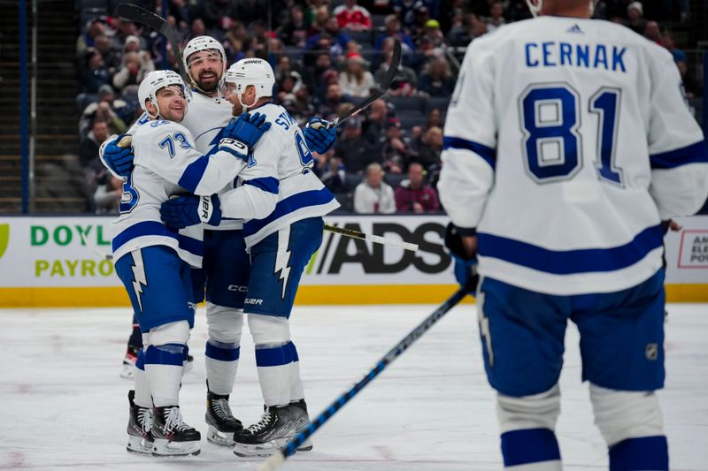 Nov 2, 2023; Columbus, Ohio, USA;  Tampa Bay Lightning left wing Conor Sheary (73) celebrates with teammates after scoring a goal against the Columbus Blue Jackets in the second period at Nationwide Arena. Mandatory Credit: Aaron Doster-USA TODAY Sports