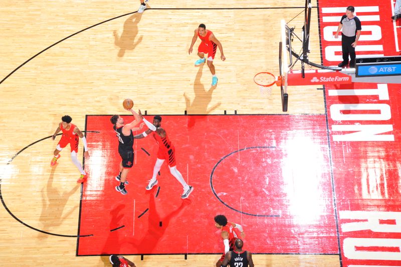 HOUSTON, TX - JANUARY 24: Alperen Sengun #28 of the Houston Rockets shoots the ball during the game against the Portland Trail Blazers on January 24, 2024 at the Toyota Center in Houston, Texas. NOTE TO USER: User expressly acknowledges and agrees that, by downloading and or using this photograph, User is consenting to the terms and conditions of the Getty Images License Agreement. Mandatory Copyright Notice: Copyright 2024 NBAE (Photo by Logan Riely/NBAE via Getty Images)
