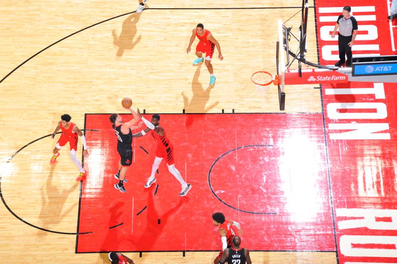 HOUSTON, TX - JANUARY 24: Alperen Sengun #28 of the Houston Rockets shoots the ball during the game against the Portland Trail Blazers on January 24, 2024 at the Toyota Center in Houston, Texas. NOTE TO USER: User expressly acknowledges and agrees that, by downloading and or using this photograph, User is consenting to the terms and conditions of the Getty Images License Agreement. Mandatory Copyright Notice: Copyright 2024 NBAE (Photo by Logan Riely/NBAE via Getty Images)