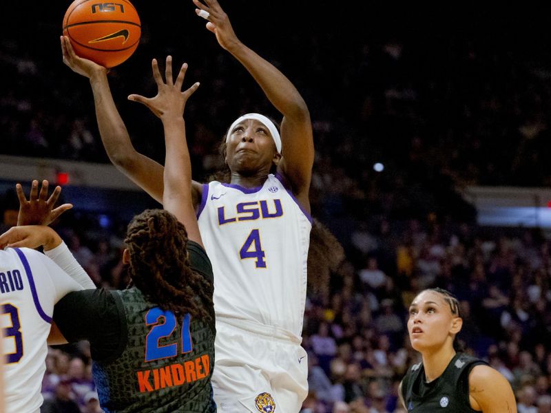 Feb 4, 2024; Baton Rouge, Louisiana, USA; LSU Lady Tigers guard Flau'jae Johnson (4) shoots against Florida Gators forward Eriny Kindred (21) during the first half at Pete Maravich Assembly Center. Mandatory Credit: Matthew Hinton-USA TODAY Sports