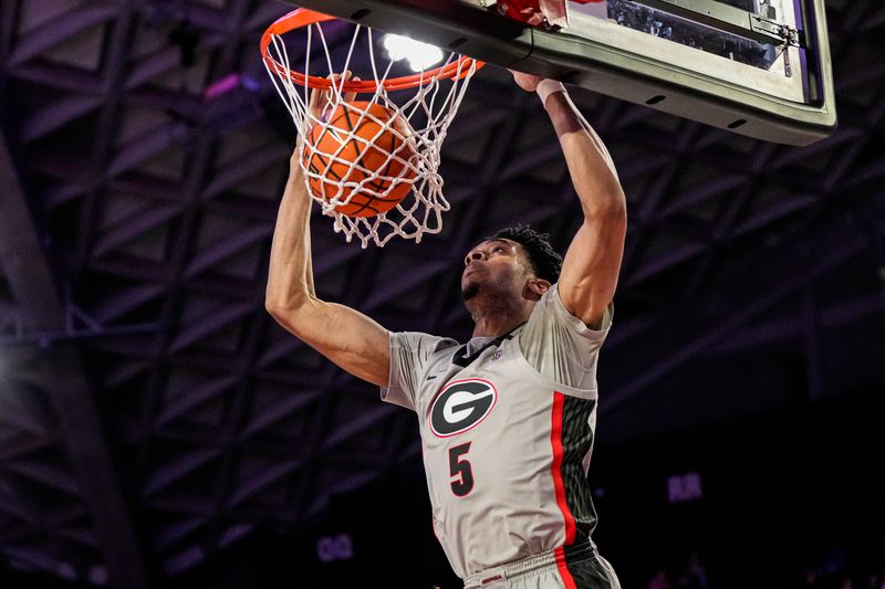 Feb 14, 2023; Athens, Georgia, USA; Georgia Bulldogs center Frank Anselem (5) dunks against the LSU Tigers during the second half at Stegeman Coliseum. Mandatory Credit: Dale Zanine-USA TODAY Sports