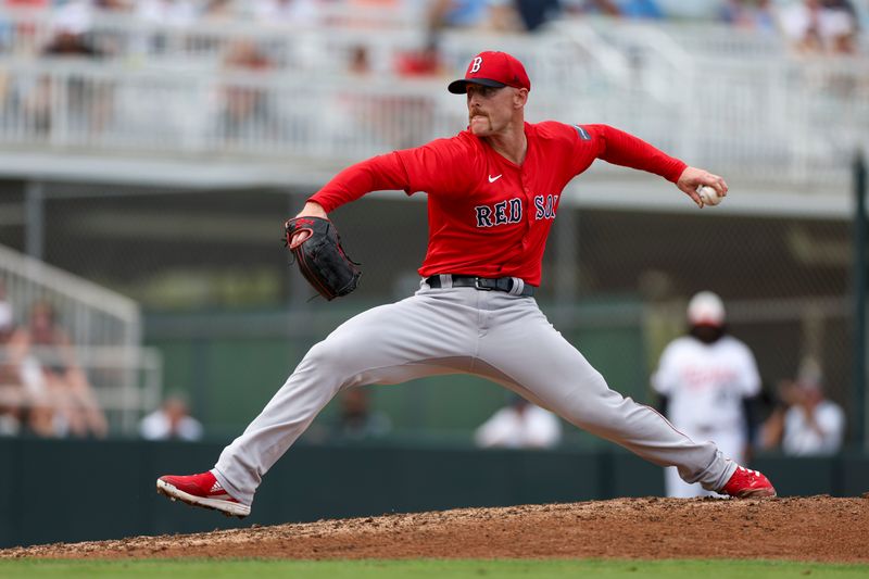 Mar 6, 2024; Fort Myers, Florida, USA;  Boston Red Sox pitcher Cam Booser (71) throws a pitch against the Minnesota Twins in the fifth inning at Hammond Stadium. Mandatory Credit: Nathan Ray Seebeck-USA TODAY Sports