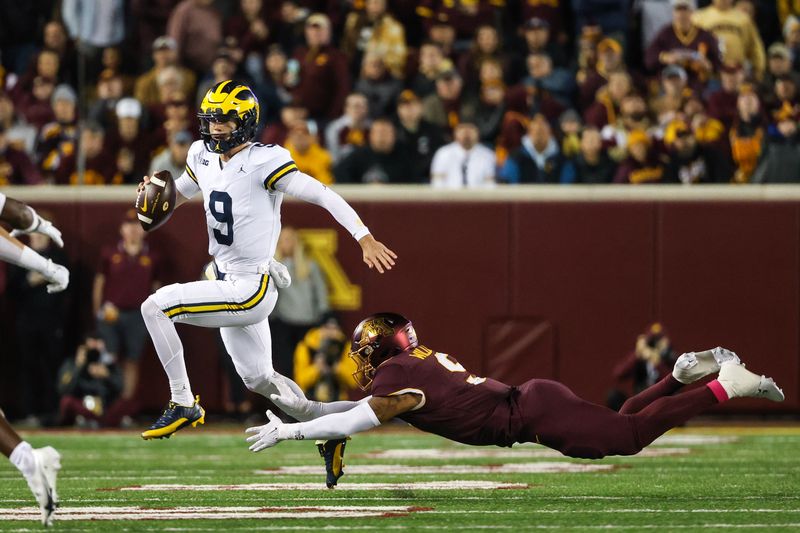 Oct 7, 2023; Minneapolis, Minnesota, USA; Michigan Wolverines quarterback J.J. McCarthy (9) runs the ball against the Minnesota Golden Gophers during the first quarter at Huntington Bank Stadium. Mandatory Credit: Matt Krohn-USA TODAY Sports