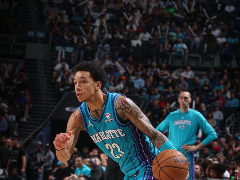 CHARLOTTE, NC - MARCH 15:  Tre Mann #23 of the  Charlotte Hornets goes to the basket during the game on March 15, 2024 at Spectrum Center in Charlotte, North Carolina. NOTE TO USER: User expressly acknowledges and agrees that, by downloading and or using this photograph, User is consenting to the terms and conditions of the Getty Images License Agreement.  Mandatory Copyright Notice:  Copyright 2024 NBAE (Photo by Nathaniel S. Butler/NBAE via Getty Images)