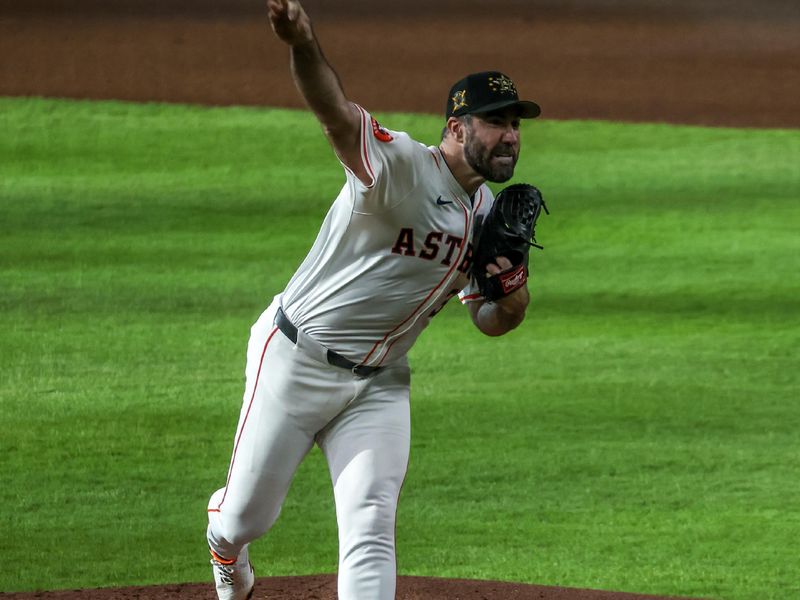 May 18, 2024; Houston, Texas, USA; Houston Astros starting pitcher Justin Verlander (35) pitches against the Milwaukee Brewers in the second inning at Minute Maid Park. Mandatory Credit: Thomas Shea-USA TODAY Sports