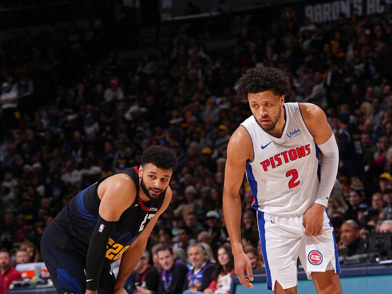 DENVER, CO - JANUARY 7: Jamal Murray #27 of the Denver Nuggets and Cade Cunningham #2 of the Detroit Pistons look on during the game on January 7, 2024 at the Ball Arena in Denver, Colorado. NOTE TO USER: User expressly acknowledges and agrees that, by downloading and/or using this Photograph, user is consenting to the terms and conditions of the Getty Images License Agreement. Mandatory Copyright Notice: Copyright 2024 NBAE (Photo by Bart Young/NBAE via Getty Images)