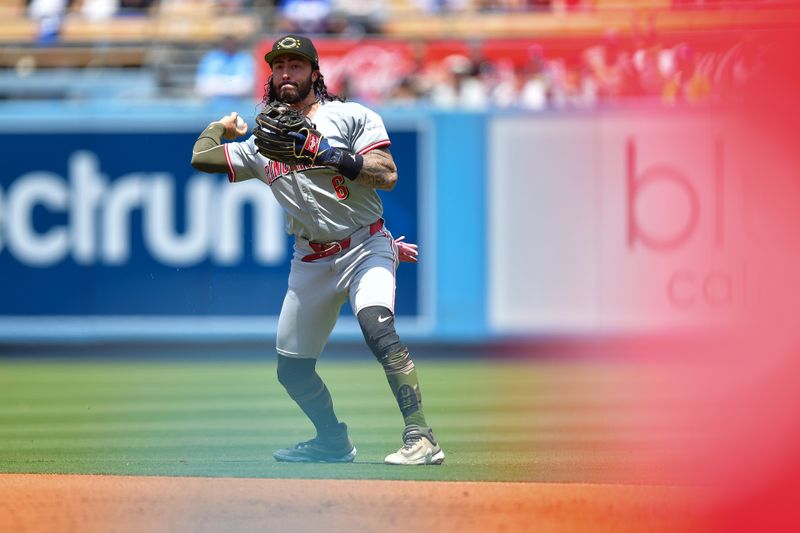 May 19, 2024; Los Angeles, California, USA; Cincinnati Reds second base Jonathan India (6) throws to first for the out against Los Angeles Dodgers right fielder Jason Heyward (23) during the second inning at Dodger Stadium. Mandatory Credit: Gary A. Vasquez-USA TODAY Sports