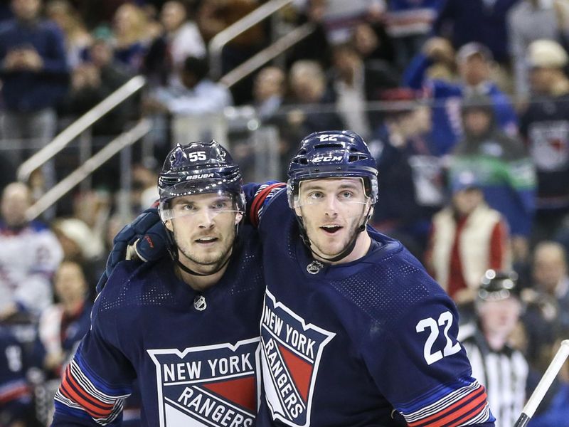 Feb 7, 2024; New York, New York, USA; New York Rangers center Jonny Brodzinski (22) celebrates with defenseman Ryan Lindgren (55) after scoring a goal in the second period against the Tampa Bay Lightning at Madison Square Garden. Mandatory Credit: Wendell Cruz-USA TODAY Sports