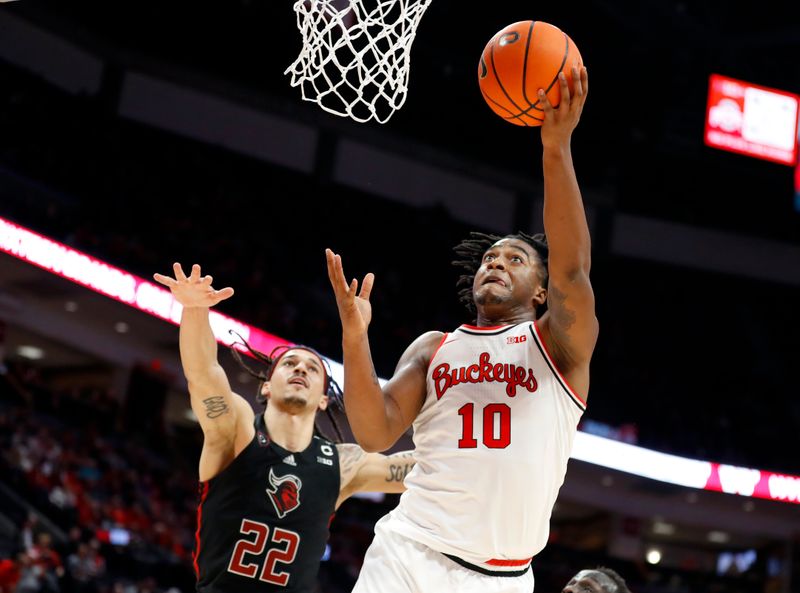 Dec 8, 2022; Columbus, Ohio, USA; Ohio State Buckeyes forward Brice Sensabaugh (10) goes to the basket as Rutgers Scarlet Knights guard Caleb McConnell (22) defends during the second half at Value City Arena. Mandatory Credit: Joseph Maiorana-USA TODAY Sports