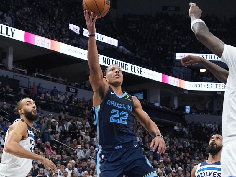 MINNEAPOLIS, MN -  JANUARY 11: Desmond Bane #22 of the Memphis Grizzlies drives to the basket during the game against the Minnesota Timberwolves on January 11, 2025 at Target Center in Minneapolis, Minnesota. NOTE TO USER: User expressly acknowledges and agrees that, by downloading and or using this Photograph, user is consenting to the terms and conditions of the Getty Images License Agreement. Mandatory Copyright Notice: Copyright 2025 NBAE (Photo by Jordan Johnson/NBAE via Getty Images)