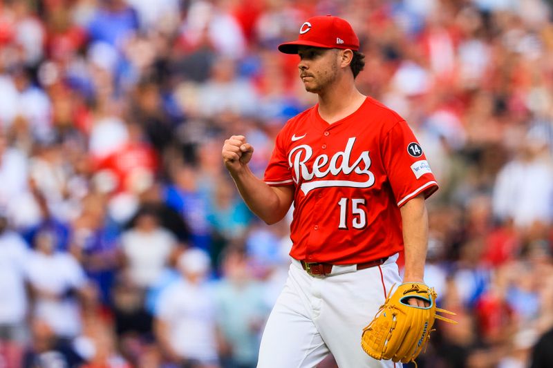 May 24, 2025; Cincinnati, Ohio, USA; Cincinnati Reds relief pitcher Emilio Pagan (15) reacts after the victory over the Chicago Cubs at Great American Ball Park. Mandatory Credit: Katie Stratman-Imagn Images
