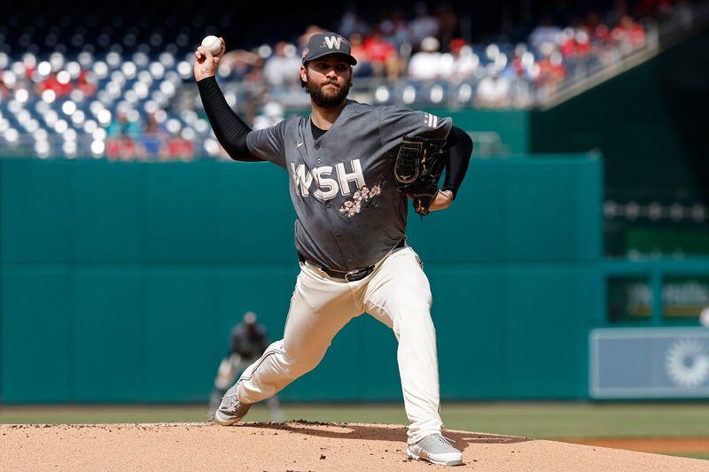 May 25, 2024; Washington, District of Columbia, USA; Washington Nationals starting pitcher Trevor Williams (32) pitches against the Seattle Mariners during the first inning at Nationals Park. Mandatory Credit: Geoff Burke-USA TODAY Sports