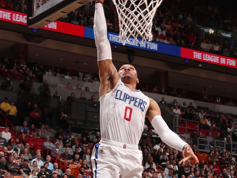 MIAMI, FL - FEBRUARY 4: Russell Westbrook #0 of the LA Clippers drives to the basket during the game against the Miami Heat on February 4, 2024 at Kaseya Center in Miami, Florida. NOTE TO USER: User expressly acknowledges and agrees that, by downloading and or using this Photograph, user is consenting to the terms and conditions of the Getty Images License Agreement. Mandatory Copyright Notice: Copyright 2024 NBAE (Photo by Issac Baldizon/NBAE via Getty Images)