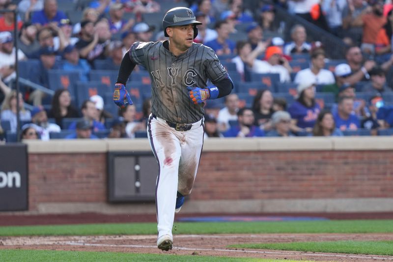 Sep 21, 2024; New York City, New York, USA; New York Mets second baseman Jose Iglesias (11) hits a single during the game against the Philadelphia Phillies at Citi Field. Mandatory Credit: Lucas Boland-Imagn Images