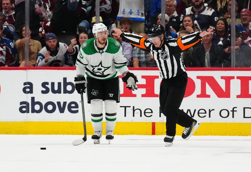 May 17, 2024; Denver, Colorado, USA; NHL referee Eric Furlatt (27) calls off a goal by Dallas Stars left wing Mason Marchment (27) (not pictured) as center Matt Duchene (95) reacts in an overtime period against the Colorado Avalanche in game six of the second round of the 2024 Stanley Cup Playoffs at Ball Arena. Mandatory Credit: Ron Chenoy-USA TODAY Sports