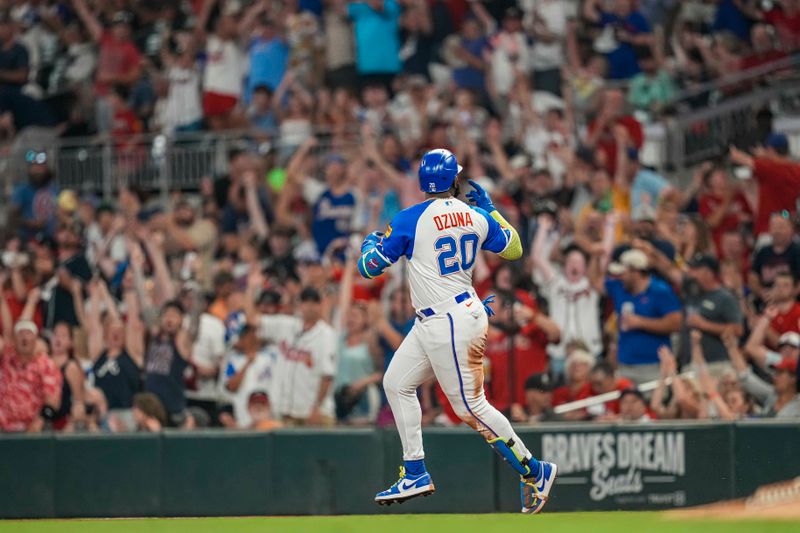 Jul 29, 2023; Cumberland, Georgia, USA; Atlanta Braves designated hitter Marcell Ozuna (20) reacts after hitting a two run home run against the Milwaukee Brewers during the seventh inning at Truist Park. Mandatory Credit: Dale Zanine-USA TODAY Sports