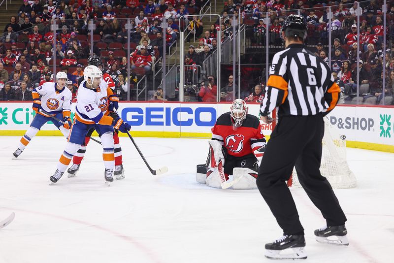 Nov 28, 2023; Newark, New Jersey, USA; New York Islanders center Bo Horvat (14) (not shown) scores a goal against the New Jersey Devils during the first period at Prudential Center. Mandatory Credit: Ed Mulholland-USA TODAY Sports