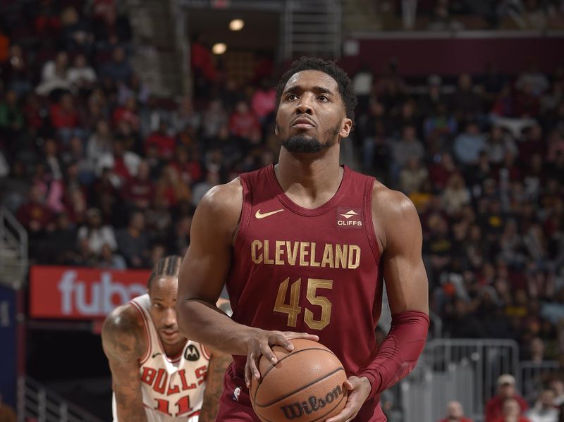 CLEVELAND, OH - FEBRUARY 14: Donovan Mitchell #45 of the Cleveland Cavaliers prepares to shoot a free throw during the game against the Chicago Bulls on February 14, 2024 at Rocket Mortgage FieldHouse in Cleveland, Ohio. NOTE TO USER: User expressly acknowledges and agrees that, by downloading and/or using this Photograph, user is consenting to the terms and conditions of the Getty Images License Agreement. Mandatory Copyright Notice: Copyright 2024 NBAE (Photo by David Liam Kyle/NBAE via Getty Images)