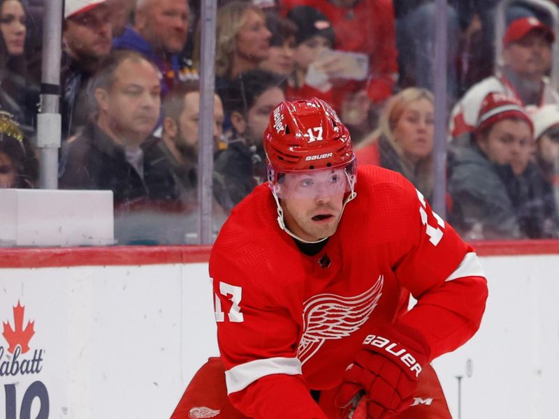 Feb 24, 2024; Detroit, Michigan, USA;  Detroit Red Wings right wing Daniel Sprong (17) skates with the puck in the second period against the St. Louis Blues at Little Caesars Arena. Mandatory Credit: Rick Osentoski-USA TODAY Sports