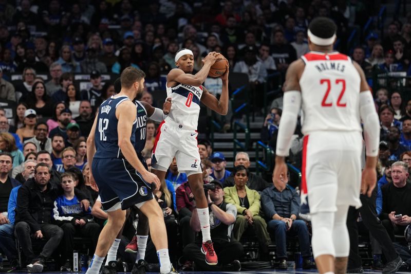 DALLAS, TX - FEBRUARY 12:   Bilal Coulibaly #0 of the Washington Wizards grabs a rebound during the game against the Dallas Mavericks on February 12, 2024 at the American Airlines Center in Dallas, Texas. NOTE TO USER: User expressly acknowledges and agrees that, by downloading and or using this photograph, User is consenting to the terms and conditions of the Getty Images License Agreement. Mandatory Copyright Notice: Copyright 2024 NBAE (Photo by Glenn James/NBAE via Getty Images)