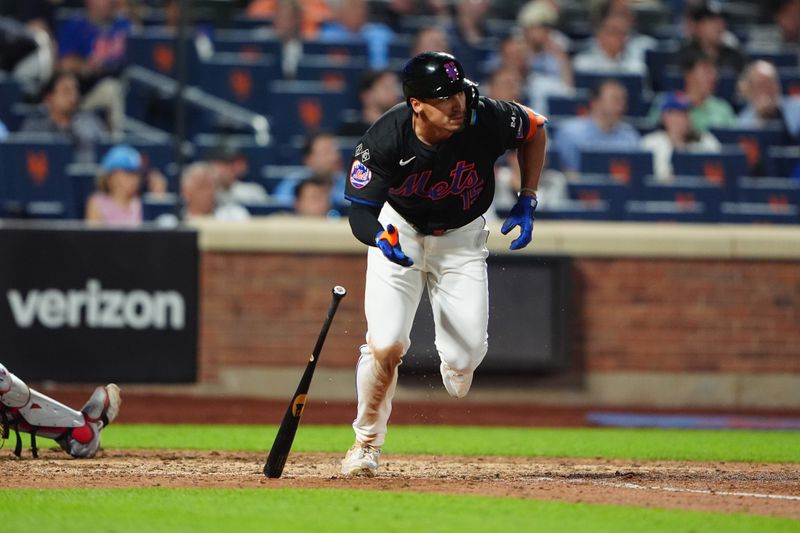 Jul 10, 2024; New York City, New York, USA; New York Mets center fielder Tyrone Taylor (15) runs out a RBI triple against the Washington Nationals during the eighth inning at Citi Field. Mandatory Credit: Gregory Fisher-USA TODAY Sports