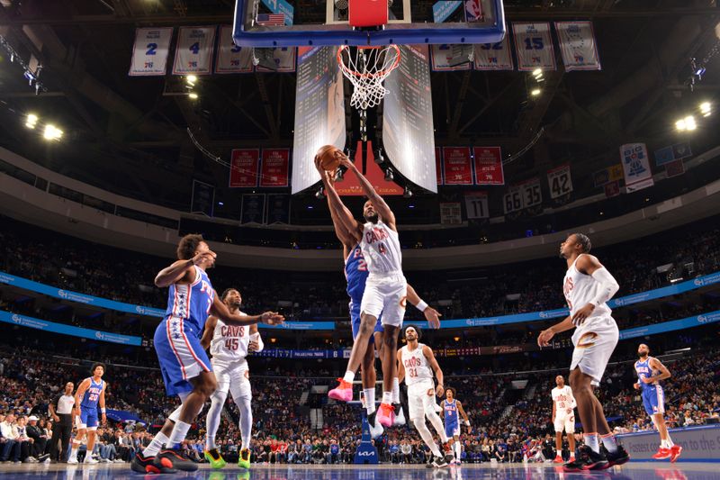 PHILADELPHIA, PA - NOVEMBER 13: Evan Mobley #4 of the Cleveland Cavaliers goes up for the rebound during the game against the Philadelphia 76ers on November 13, 2024 at the Wells Fargo Center in Philadelphia, Pennsylvania NOTE TO USER: User expressly acknowledges and agrees that, by downloading and/or using this Photograph, user is consenting to the terms and conditions of the Getty Images License Agreement. Mandatory Copyright Notice: Copyright 2024 NBAE (Photo by Jesse D. Garrabrant/NBAE via Getty Images)