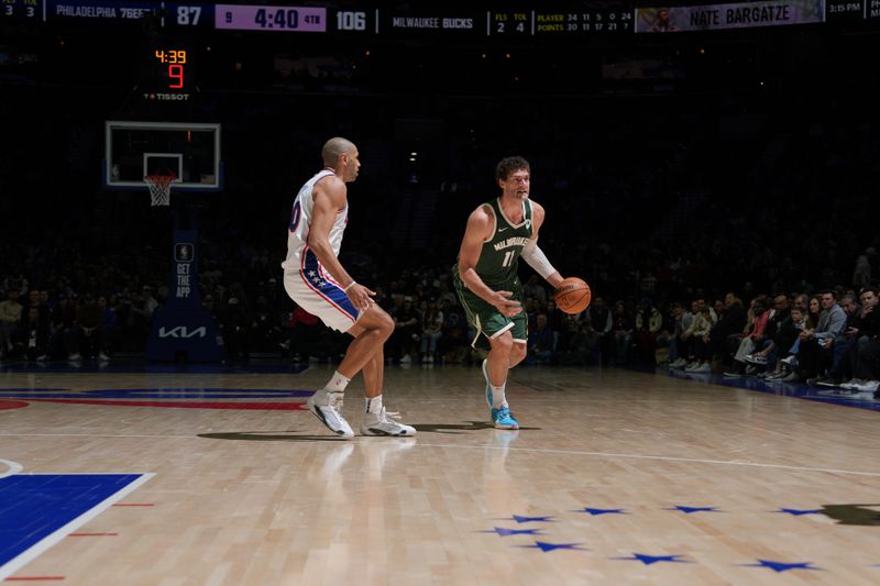 PHILADELPHIA, PA - FEBRUARY 25: Brook Lopez #11 of the Milwaukee Bucks dribbles the ball during the game against the Philadelphia 76ers on February 25, 2024 at the Wells Fargo Center in Philadelphia, Pennsylvania NOTE TO USER: User expressly acknowledges and agrees that, by downloading and/or using this Photograph, user is consenting to the terms and conditions of the Getty Images License Agreement. Mandatory Copyright Notice: Copyright 2024 NBAE (Photo by Jesse D. Garrabrant/NBAE via Getty Images)