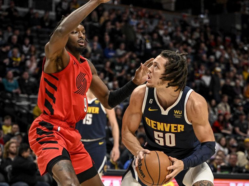 DENVER, CO - JANUARY 17: Aaron Gordon (50) of the Denver Nuggets pump fakes as Jerami Grant (9) of the Portland Trail Blazers defends during the first quarter at Ball Arena in Denver on Tuesday, January 17, 2023. (Photo by AAron Ontiveroz/MediaNews Group/The Denver Post via Getty Images)