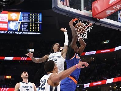 MEMPHIS, TN - OCTOBER 19: Cam Reddish #0 of the New York Knicks dunks the ball during the game against the Memphis Grizzlies  on October 19, 2022 at FedExForum in Memphis, Tennessee. NOTE TO USER: User expressly acknowledges and agrees that, by downloading and or using this photograph, User is consenting to the terms and conditions of the Getty Images License Agreement. Mandatory Copyright Notice: Copyright 2022 NBAE (Photo by Joe Murphy/NBAE via Getty Images)